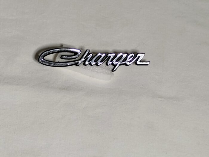 1970 Dodge Charger, Front Grill Nameplate / Emblem / Trim Molding 2998278